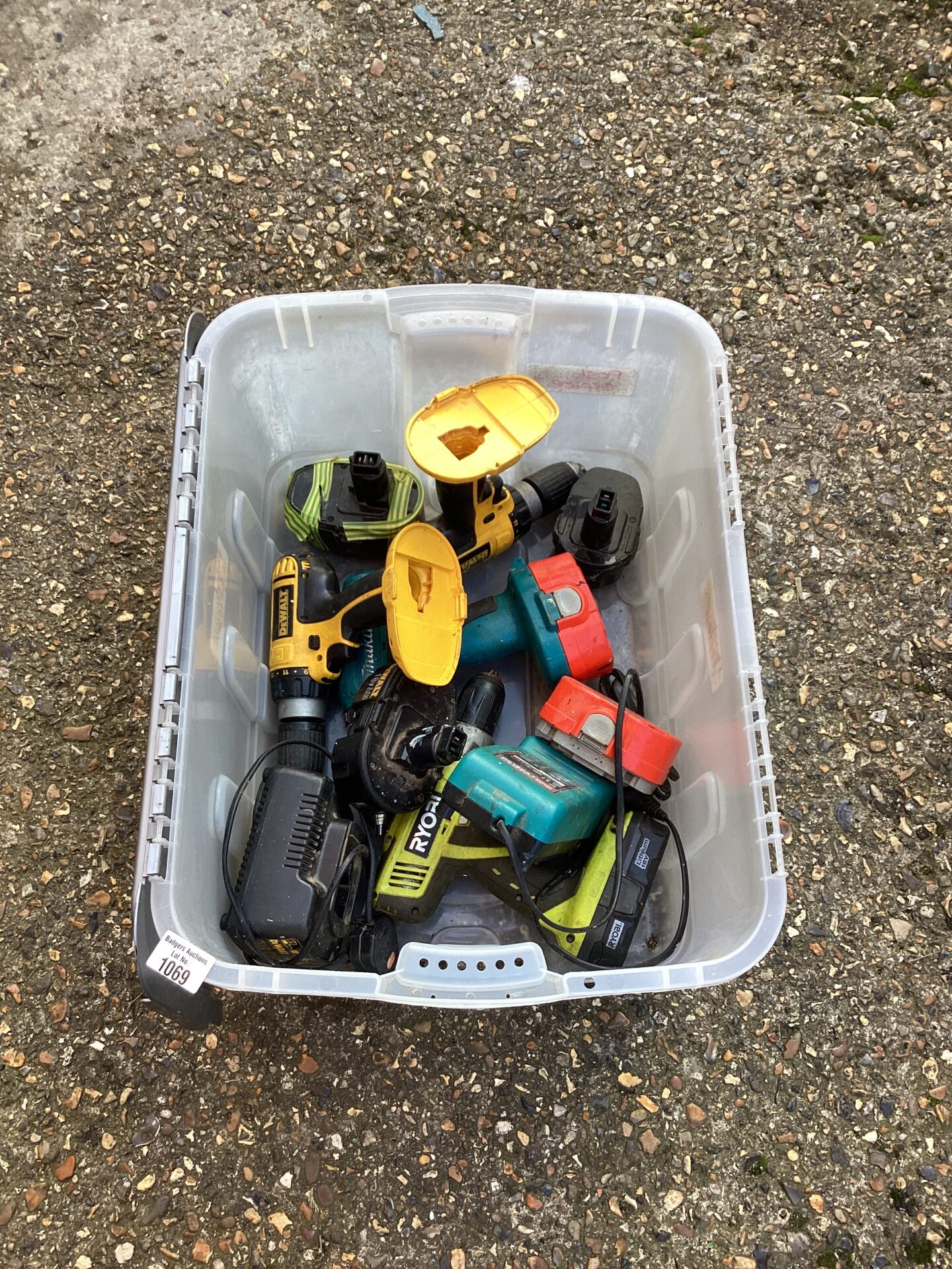 1069 Box of Dewalt and other drills for spares or repair
