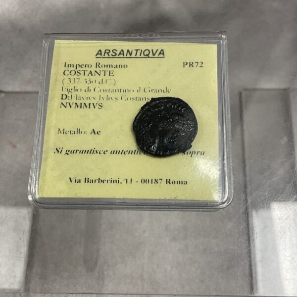Ancient Roman Constantine coin with detailed imagery.
