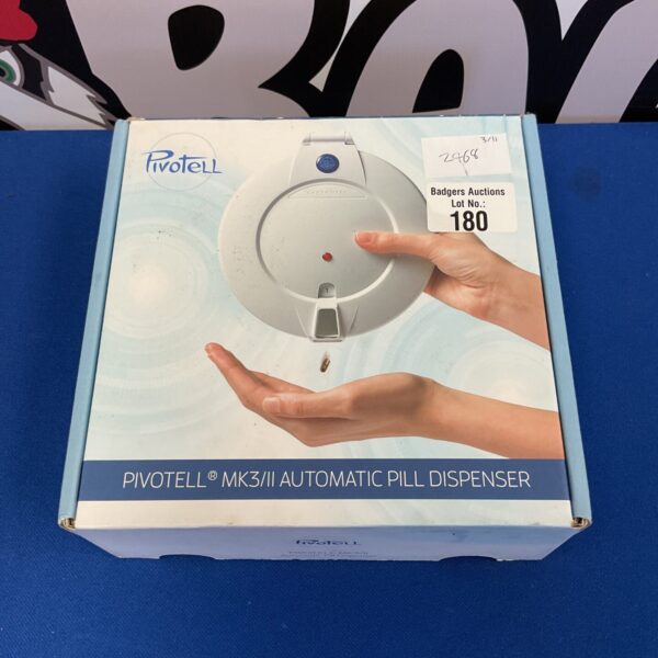 Vintage Pivotell MK3 automatic pill dispenser for medication management.