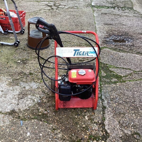 Clarke Tiger 260 pressure washer for garden cleaning tasks.