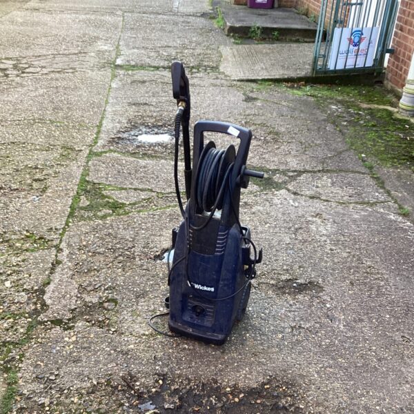 Used Wickes pressure washer for garden and patio cleaning.