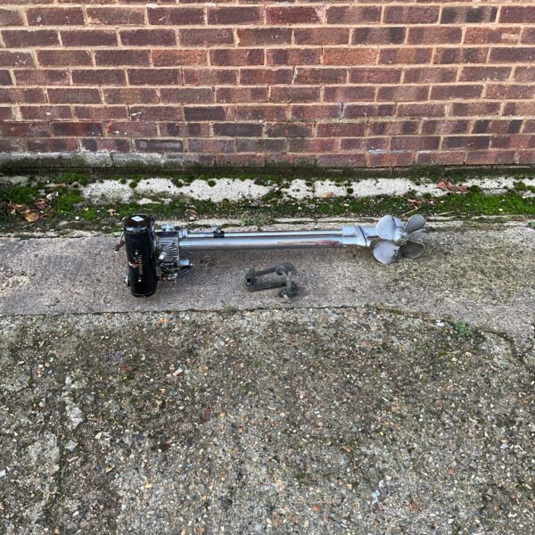 Vintage Seagull outboard engine for boat restoration.