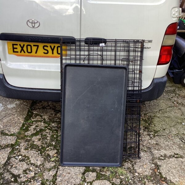 Collapsible mesh animal transfer crate for pet transport.