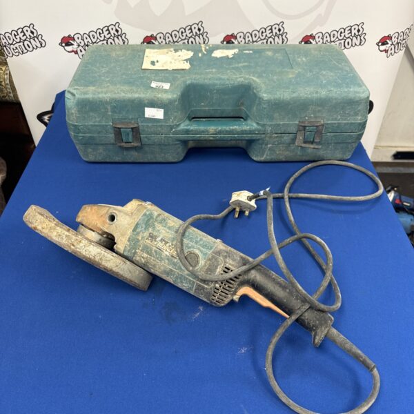 Makita angle grinder offered for spares or repair, showing the tool and case.