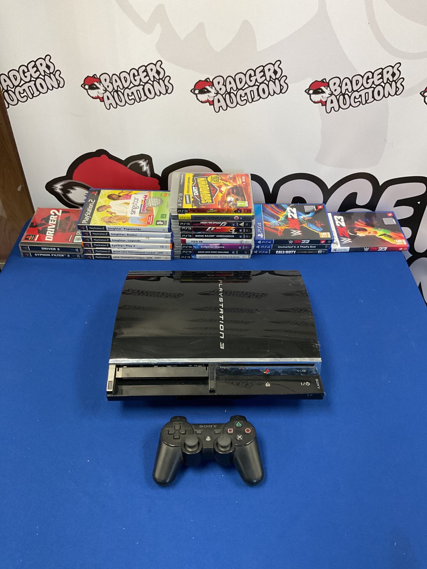 190 PlayStation 3 console with controller and cables with collection of PlayStation 1,2,3 and 4 games