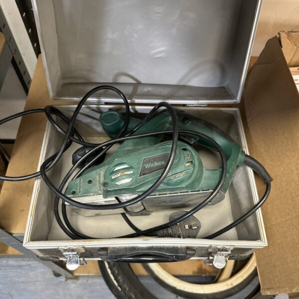 Wickes electric planer inside its original carrying case.
