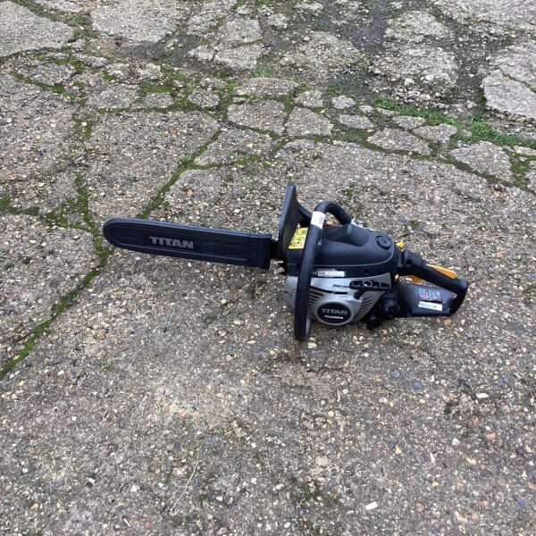 Used Titan petrol chainsaw for garden and DIY projects.