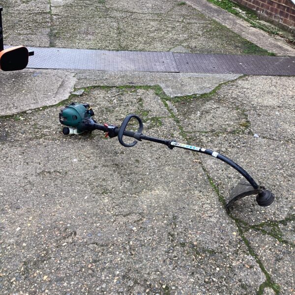 Gardentec petrol strimmer for garden maintenance and trimming.