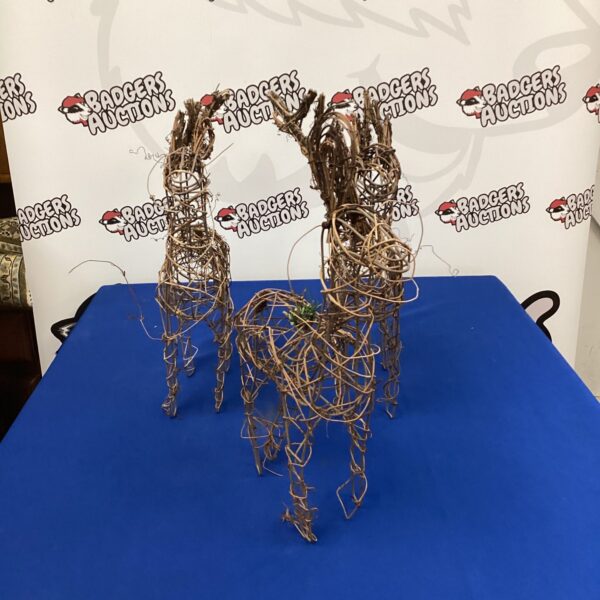Set of three rustic stick reindeer Christmas decorations.