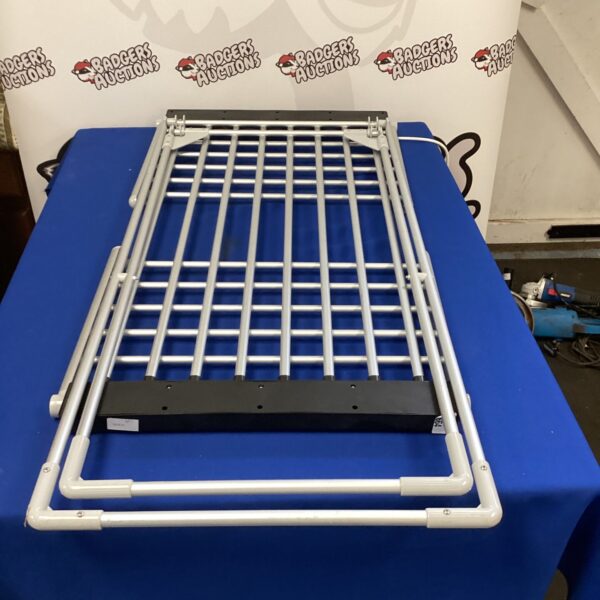 White electric clothes dryer for indoor laundry.