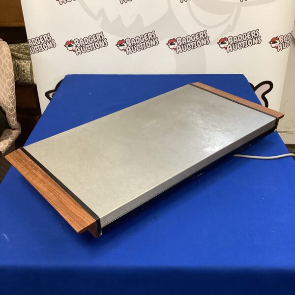 Vintage Ekco Hawkins hotplate for keeping food warm.