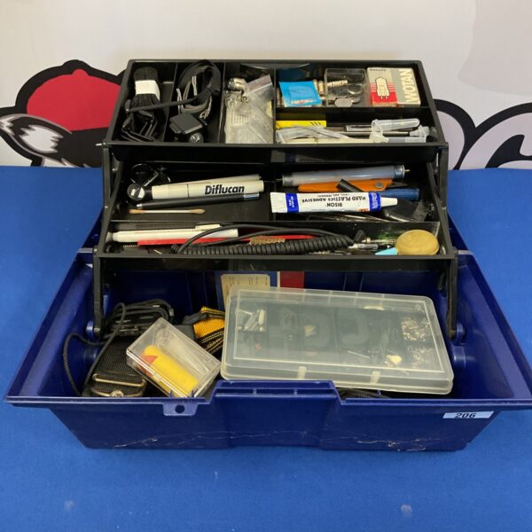 Open plastic toolbox filled with various hand tools and components.