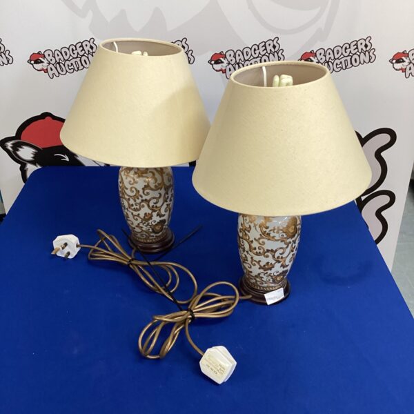 Pair of John Lewis ceramic table lamps with floral design.