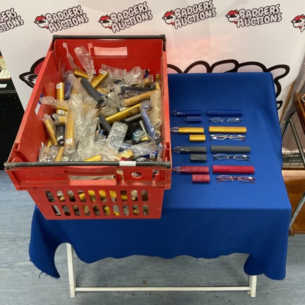 Crate filled with a large lot of vintage and modern glasses.