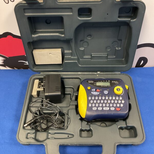 Brother P-touch label maker in carrying case, vintage handheld printer.