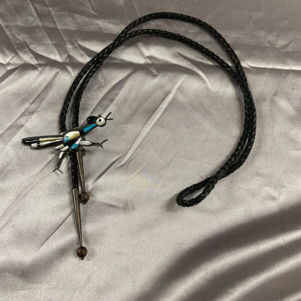 Vintage cowboy bootlace with turquoise and longhorn steer pendant.