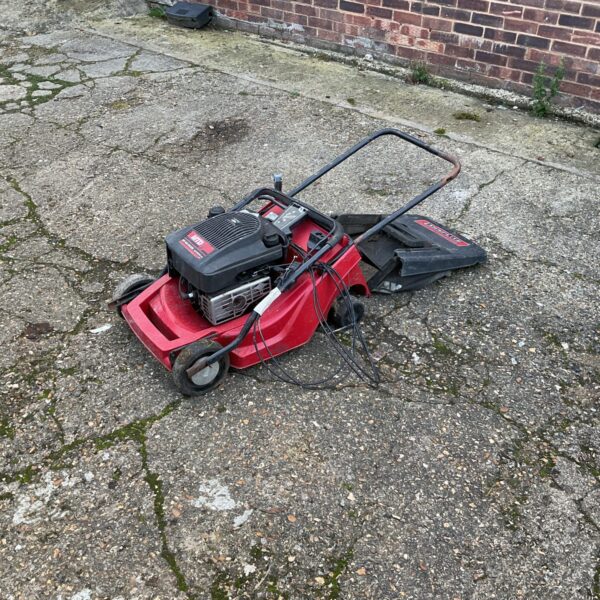 Used MTD SP 46 GLXR petrol lawn mower in a garden setting.