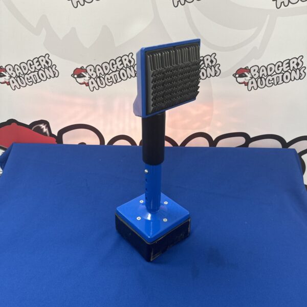 Used carpet stretching tool for professional floor installation.