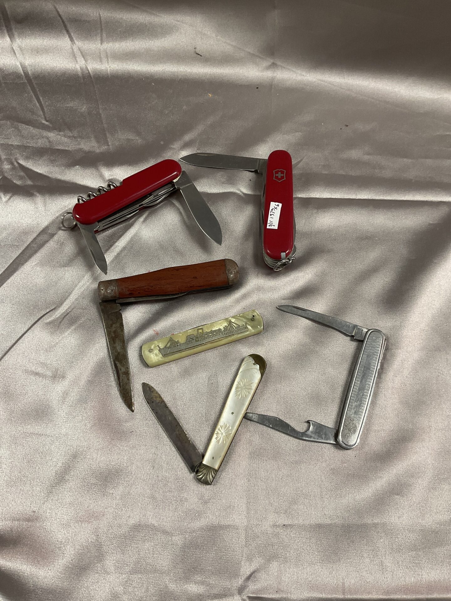795 Collection of pocket knives inc Swiss army and silver fruit knives damaged