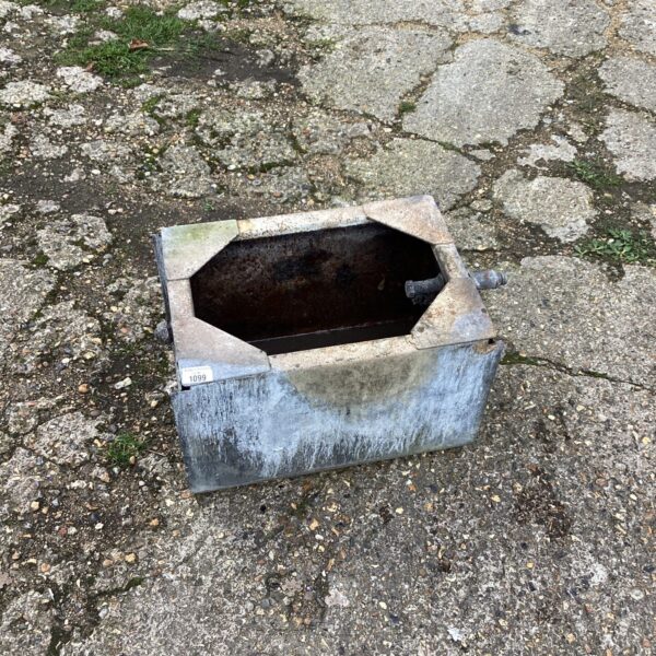 Vintage galvanised water tank for farm or garden use.