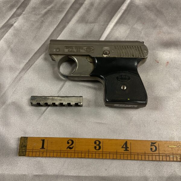 Vintage Mondial 1949 .22 caliber starting pistol for collectors.