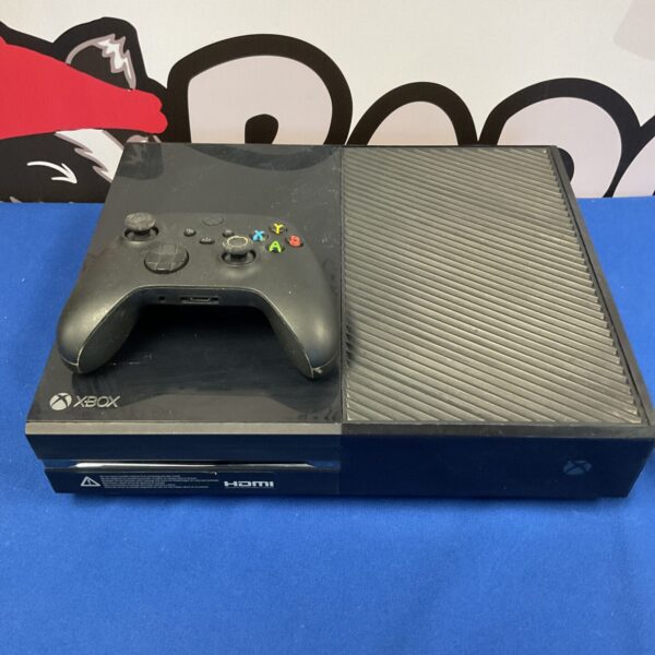 Xbox One console with controller, pre-owned gaming system.