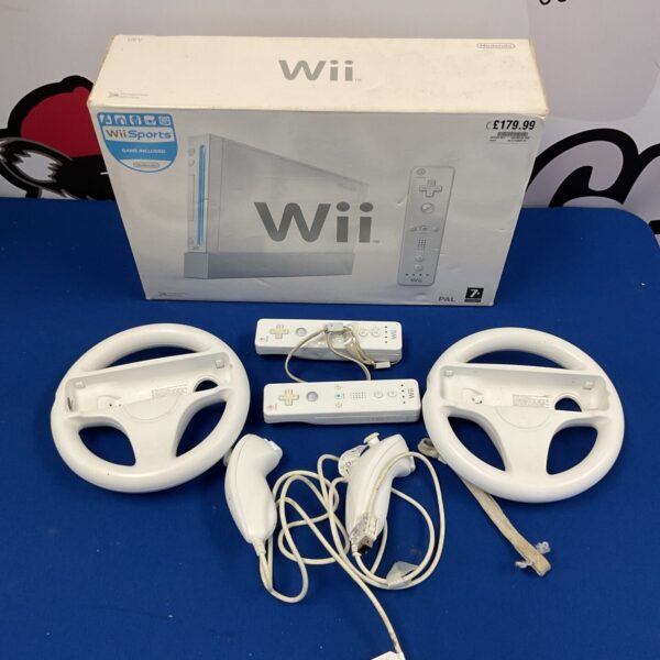 Boxed Nintendo Wii console with accessories, model RVL-001.