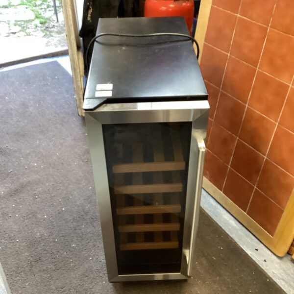 Black countertop wine chiller for beverages and wine.
