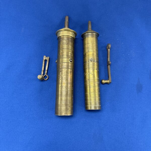 Antique Hadji Kevork brass herb grinder with crank handle.