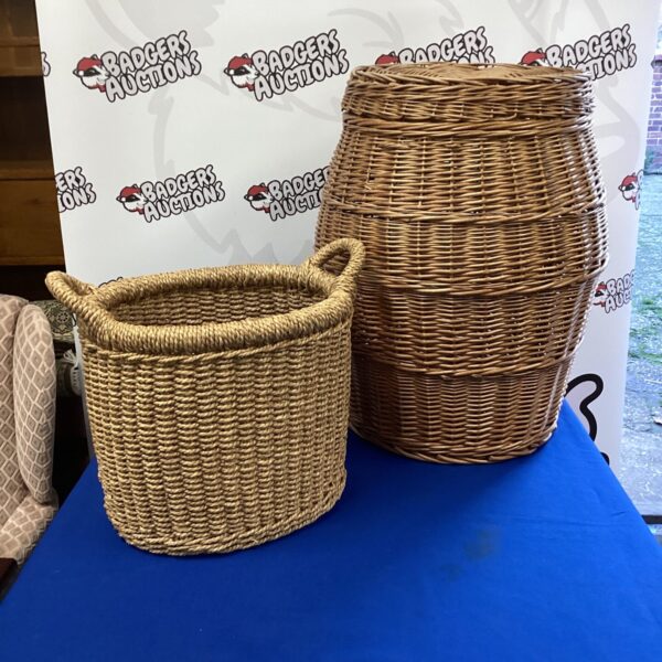 Pair of vintage wicker baskets for laundry and storage.