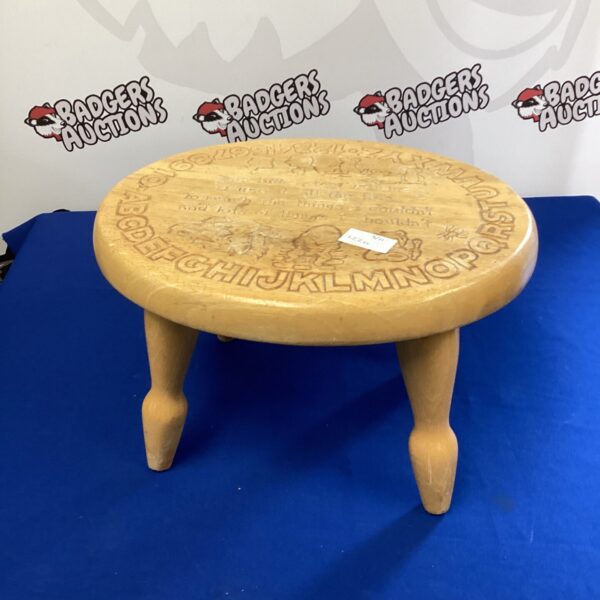 Vintage nursery rhyme alphabet stool with letters around the seat.