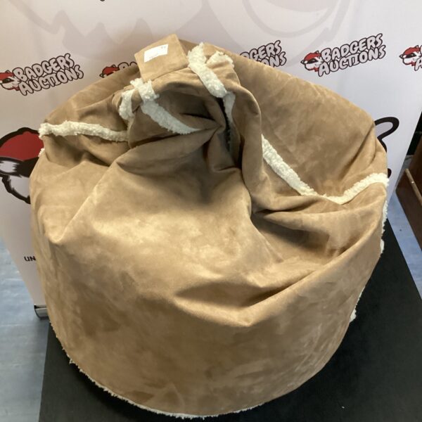 Comfortable suede beanbag chair for relaxed lounge seating.