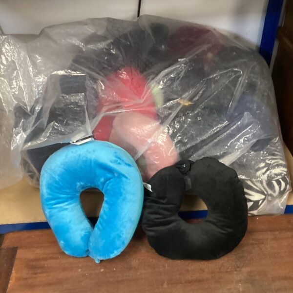 Blue travel neck cushion for comfortable neck support during travel.