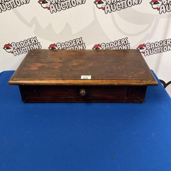 Vintage oak stationery drawer for desk organisation.