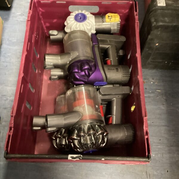 Dyson DC16 handheld vacuum cleaner in a box.