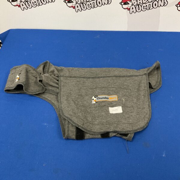 Grey ThunderShirt dog jacket for anxiety relief.