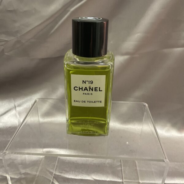 Vintage Chanel No 19 Eau de Toilette perfume bottle, classic fragrance.