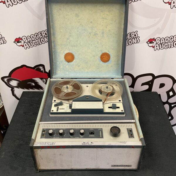 Vintage Baird Varsity reel to reel player with reels.