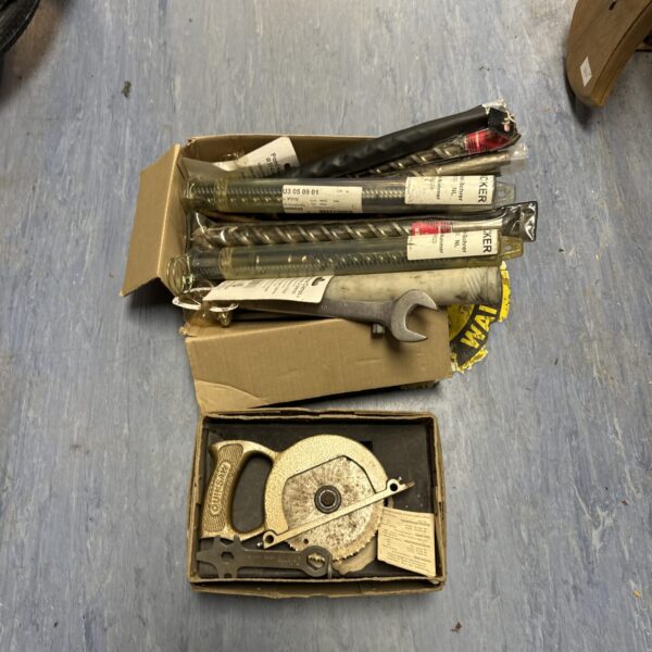 Vintage tool lot featuring a Quiksaw and drill bits.