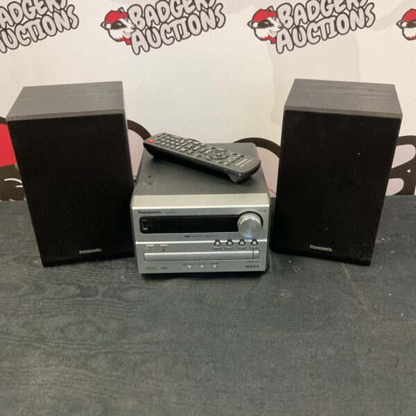 Panasonic SA-PM02 CD player with speakers and remote control.
