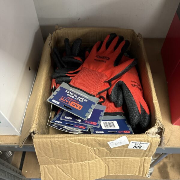 Box of new medium-sized work gloves for hand protection.