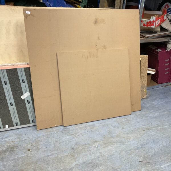 Two fibre board sheets for DIY and crafting projects.