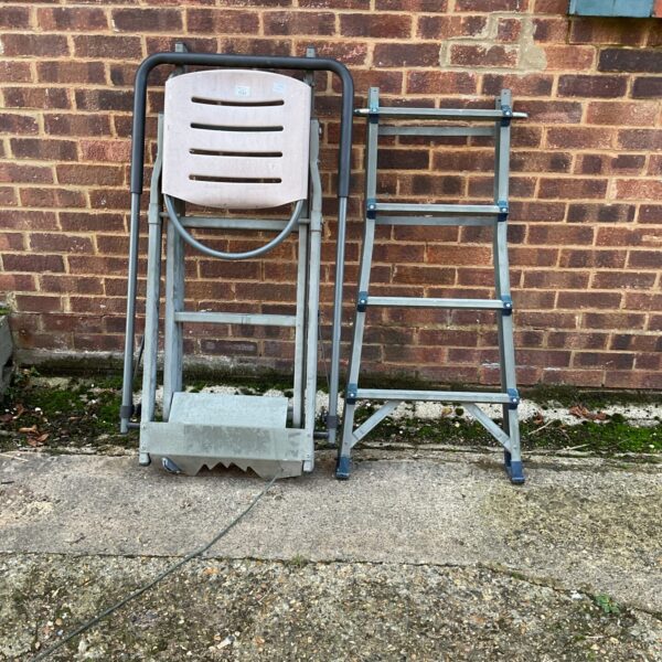 Side view of a vintage hunters shooting chair.