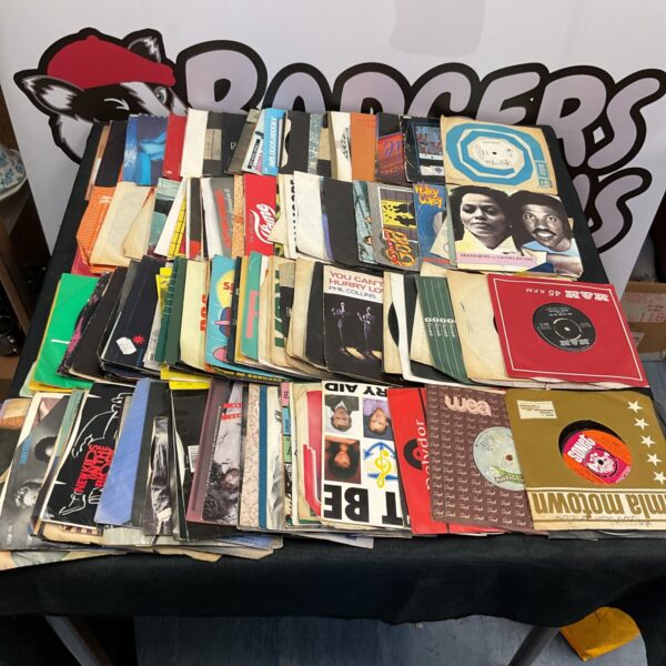Vintage 7-inch vinyl record collection featuring Diana Ross and Lionel Richie.