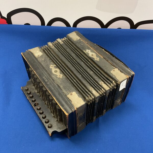 Front view of a vintage German steel reed accordion.