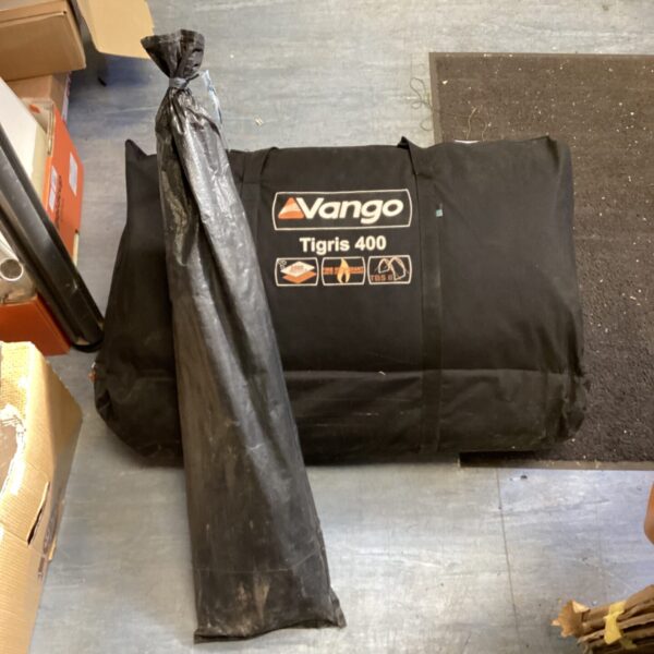 Used Vango Tigris 400 tent rolled up for storage.