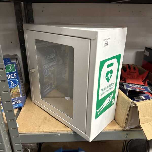 Empty white defibrillator cabinet for emergency medical use.