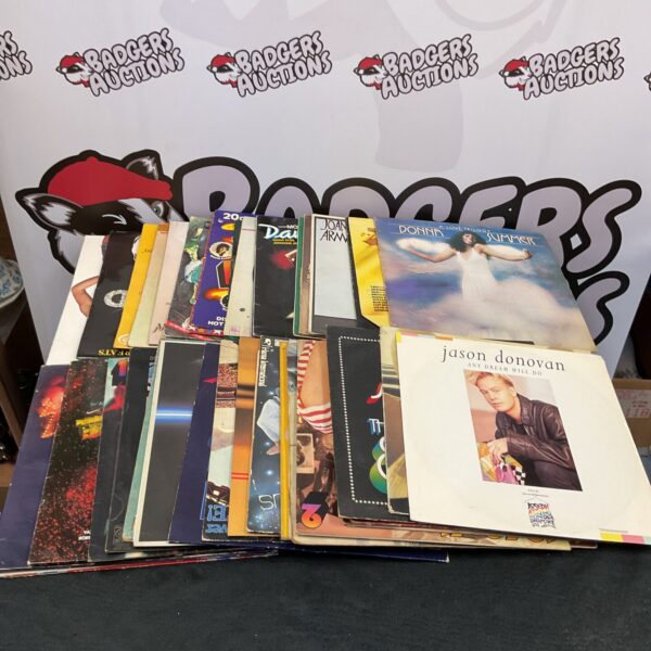 Large collection of 12” vinyl records including Jason Donovan and Donna Summer