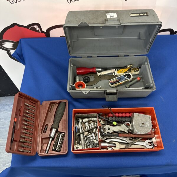 Vintage Holt plastic toolbox filled with various hand tools.