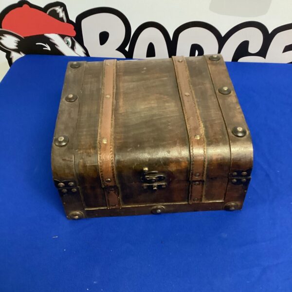 Antique wooden storage box with leather banding.
